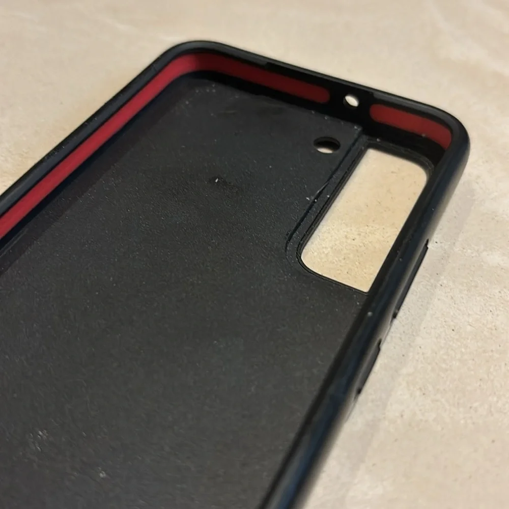 Two Samsung S22 Cases Casetify and Otterbox Black in color